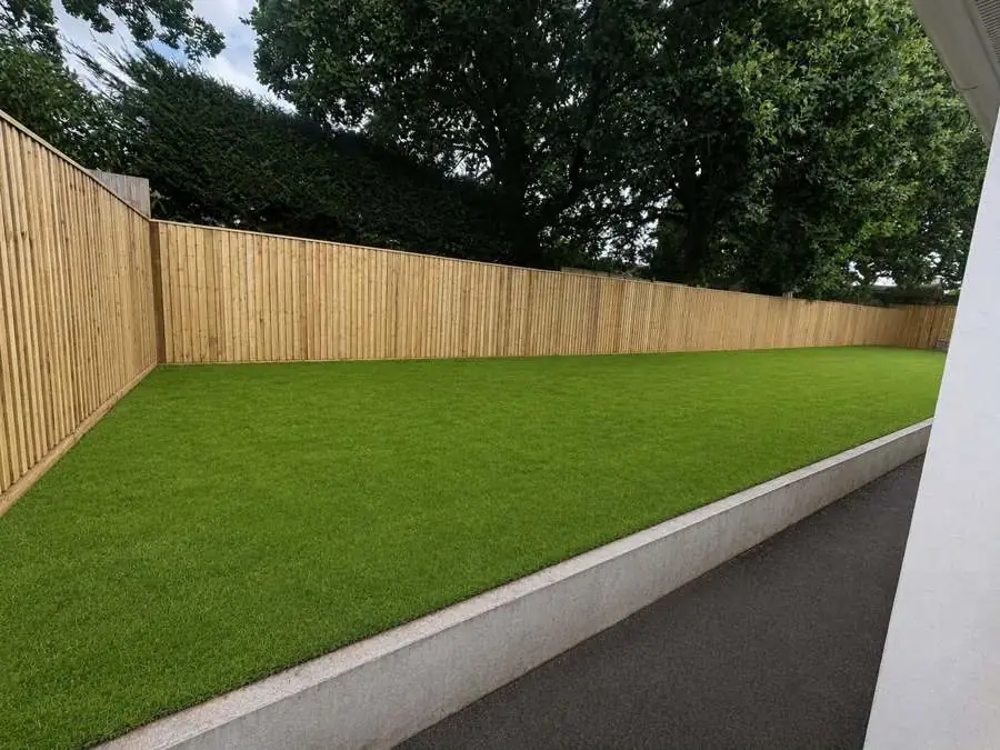 Closeboard fence installation with artificial grass by Cardiff fencing contractors F&F Property Services