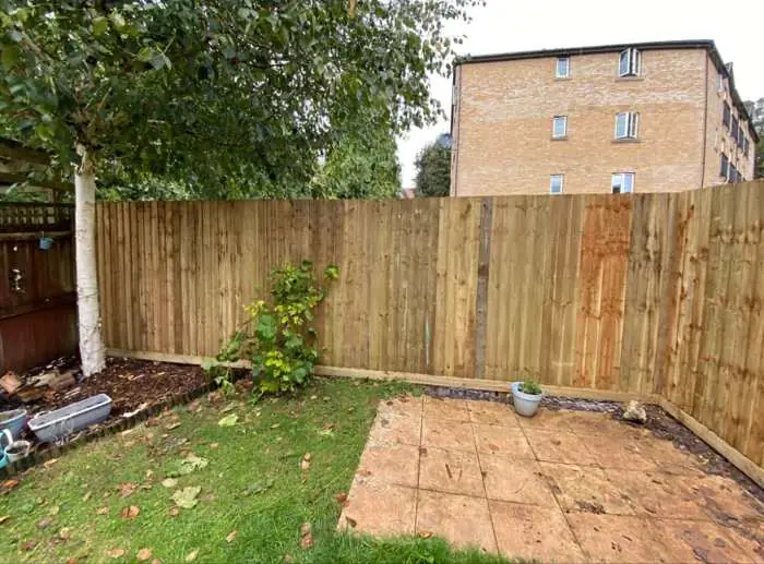 Closeboard garden fence installation
